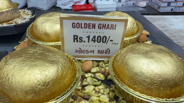 Surat Ghari shines during Sharad Purnima with gold, silver, and traditional varieties enjoyed by locals and overseas buyers.