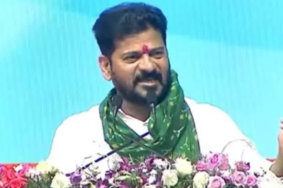 CM-Revanth-Reddy-announces-Indiramma-Houses-Funds-for-Adivasi-families-in-Asifabad.png