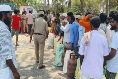 Gas-cylinders-distributed-under-police-guard-in-Thorrur-amid-consumer-protest.png