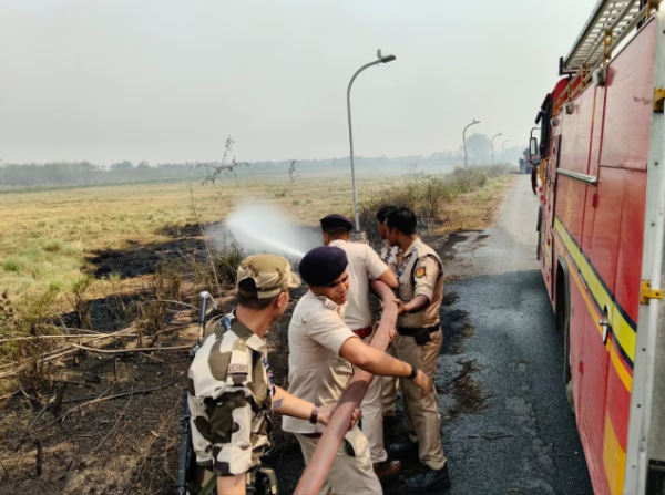 Gaya Airport Fire spreads across dry bushes inside airport premises in Bihar
