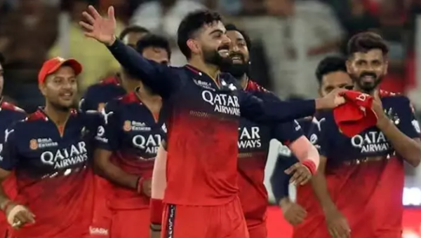 IPL 2025 Winner RCB team celebrating their maiden IPL trophy victory in Ahmedabad