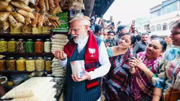 Jhal Muri Magic in Jhargram – Narendra Modi enjoying jhal muri during West Bengal election campaign