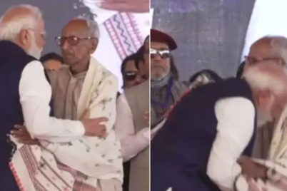 Modi-Touches-Feet-of-Makhanlal-Sarkar-at-Suvendu-Adhikari-swearing-in-ceremony.png