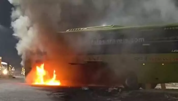 Private travel bus catches fire at Anakapalli on national highway near Regupalem