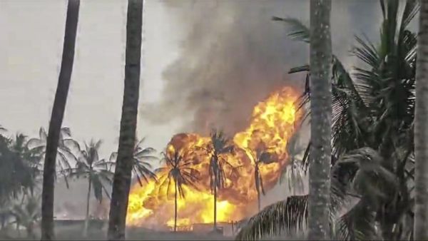 Firefighters and experts working to control a gas well blaze in Andhra Pradesh