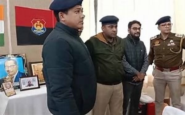 Tripura police detaining Youth Congress leader Shahjan Islam